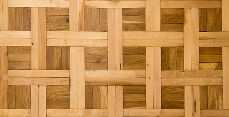 old wooden background, parquet floor, square, weaving.