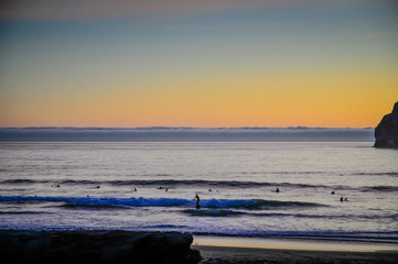 Obraz premium Sunset at Pacific City Beach, Oregon Coast, USA