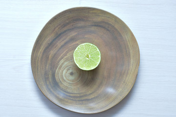 Tahiti lemons, whole and sliced