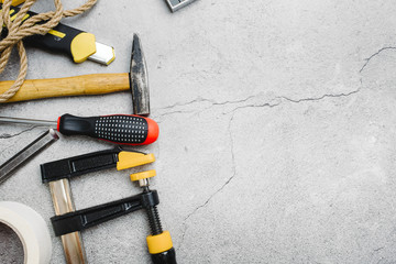 Flat lay Work tools on concrete background.