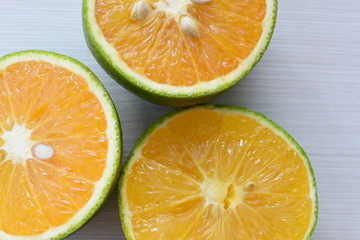 fresh oranges whole and sliced