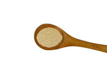 Instant yeast isolated on white. Dry yeast in wooden spoon on white background