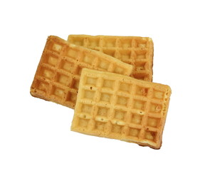 Freshly baked belgian waffles isolated on white background.