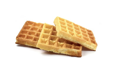 Freshly baked belgian waffles isolated on white background.