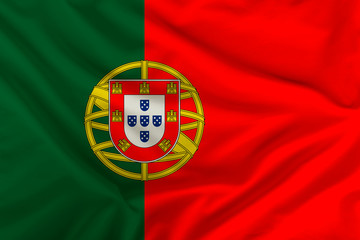 Fototapeta premium silk national flag of the modern state of portugal with beautiful folds, concept of tourism, economy, politics, emigration