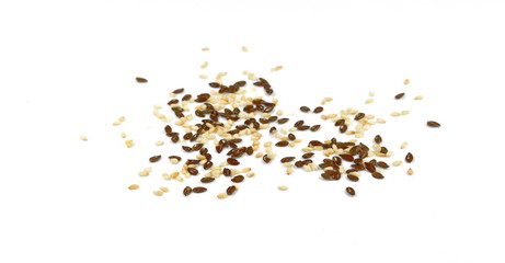 Organic Linseed or Flaxseed (Linum usitatissimum)  and sesame isolated on white background.