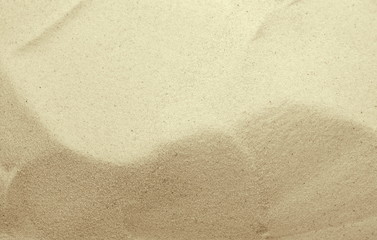 Golden Sand on the beach as background. Sand Texture. Golden sand. Background from fine sand.