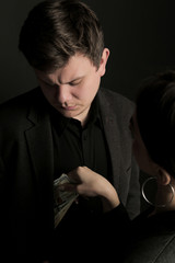 Concept for corruption and bribing fraud finance with bundle of dollar