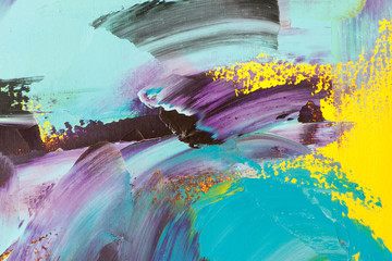 Textured background of oil paint in yellow and blue tones, selective focus