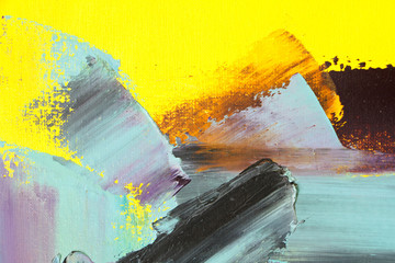 Textured background of oil paint in yellow and blue tones, selective focus
