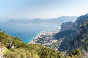 Panoramic view on the sea with cityscape from statue of Santa Rosalia on Monte Pellegrino on a beautiful sunny day - Palermo, Sicily.