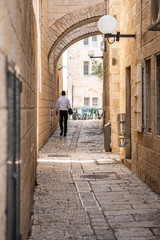 Young jew walking down the street 