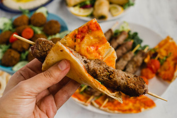 Lebanese kebab meat eaten with pita bread as in traditional middle eastern cuisine