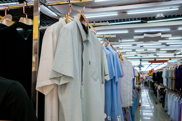 China, Heihe, July 2019: sale of men's shirts in Huafu shopping center