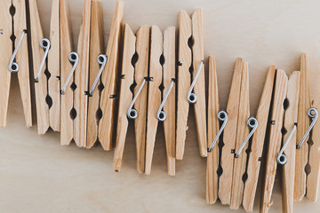 group of wooden peg to hang the washing, sustainable living and alternative to plastic