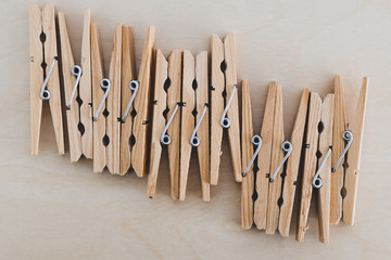 group of wooden peg to hang the washing, sustainable living and alternative to plastic