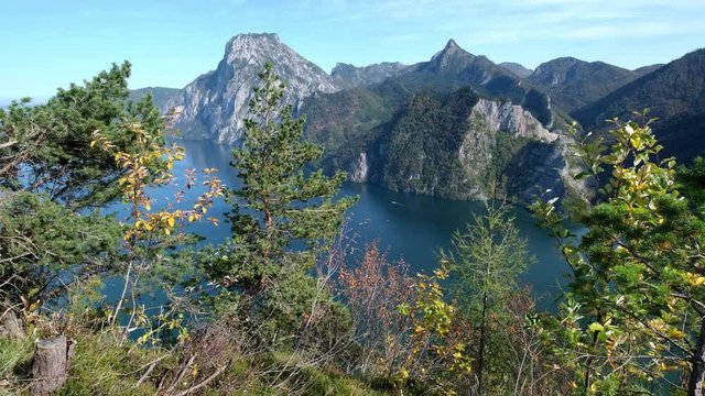 Peaceful autumn Alps mountain Traunsee lake and Traunstein mountain view from Kleiner Sonnstein rock summit, Ebensee, Upper Austria.