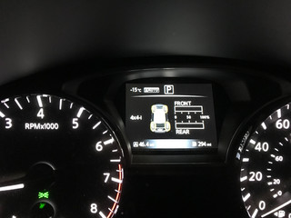 car dashboard showing freezing cold temperature in winter