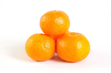 Small orange with leaf isolated on white background. Mandarin orange. Tangerines orange with leaf.