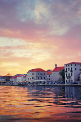 Beautiful sunset landscape. Old croatian town on the sea shore.