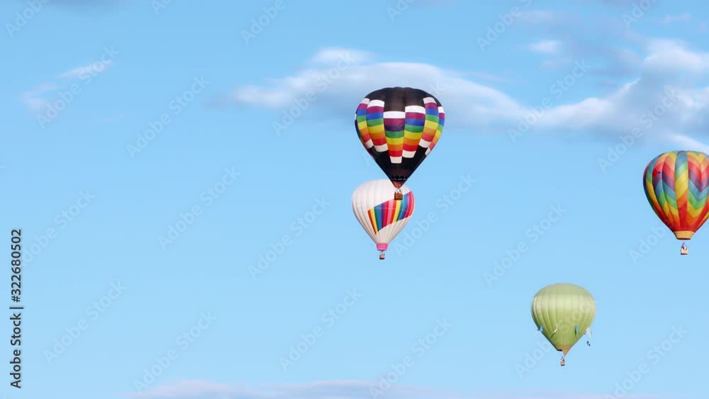 Sticker colorful hot air balloons in sunny blue sky, 4k