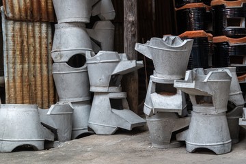 Stack of brand new stove made from cement in the factory waiting for transportation.