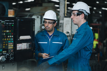 Professional team, quality control, stand maintenance, talk in the Warehouse factory. Team Engineer...