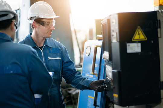 Professional team, quality control, stand maintenance, talk in the Warehouse factory. Team Engineer Factory operator Operating meetings