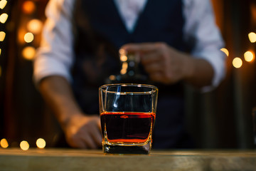 Bartender Serve Whiskey, on wood bar,