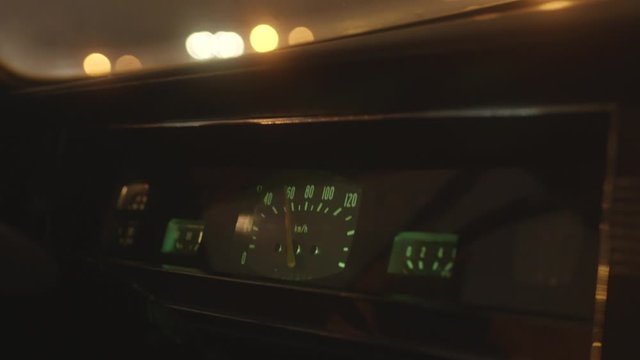 Close-up of dashboard in interior of moving old automobile in Russia. Stock footage. Retro cars and their interiors