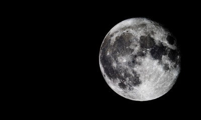 Full moon texture /  It is the fifth-largest satellite in the Solar System, and by far the largest among planetary satellites relative to the size of the planet that it orbits.