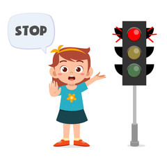 happy cute kid girl with traffic sign