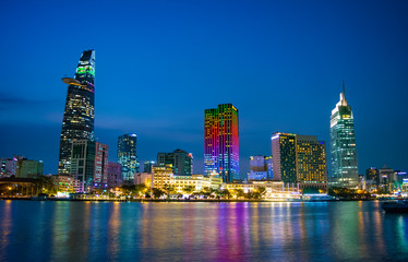 Night time scenery of District 1 Ho Chi Minh City, Vietnam, as seen from District 2 across Saigon River.