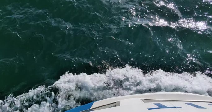 Large Ferry vessel treading water through rough green waters of Halifax Harbour