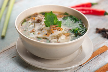 keow teow sup or ladna flat noodles soup in traditional malay style