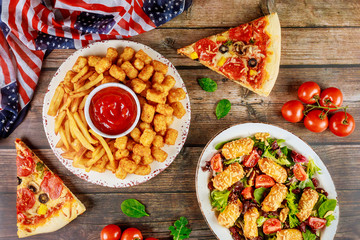 Independence Day party table with delicious food for american holiday.