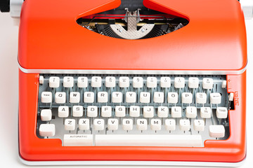 Portable Manual Typewriter In Red Orange