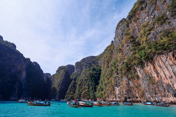Vacation in Thailand. Phi Leh lagoon of Phi Phi Leh Island. Beautiful landscape with sea, boat and rocks.