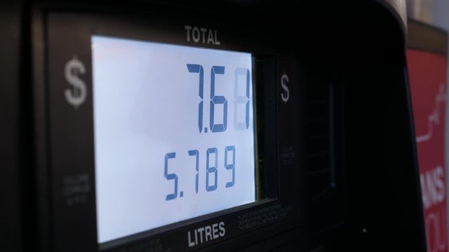 Big screen of rising gas prices on pump screen with 4k resolution