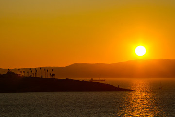 navigable strait between the islands at sunset