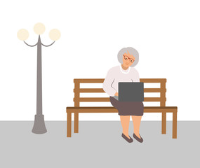 Old elegant silver haired woman in glasses sitting on bench with laptop in park next to lantern and working. Happy cute grandmother talking with family in social media. Vector cartoon on white.