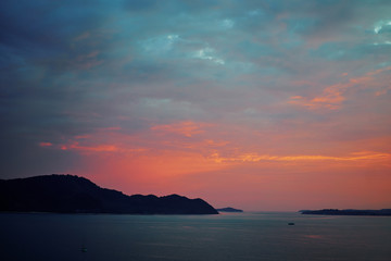 Beautiful landscape. Colorful sunset on the sea shore.