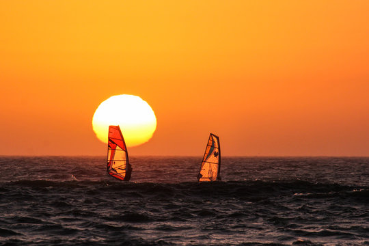 Unforgettable Windsurfing at sunset