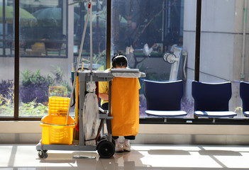 Closeup of janitorial, cleaning equipment and tools for floor cleaning at the airport terminal.