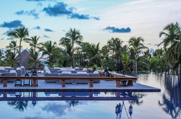 Lounge by the rooftop pool in a luxury hotel