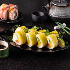 sushi on the black background