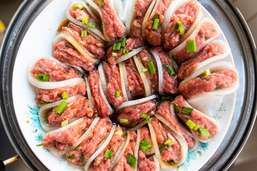 A plate of delicious Chinese dishes, mutton and radish