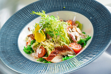 salad with smoked eel and vegetables
