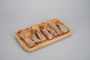 Dried bamboo shoot is a very healthy and nutritious food, it is in the white background