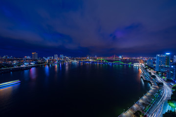 Fototapeta premium Nightscape of Da Nang city with dragon bridge, Vietnam